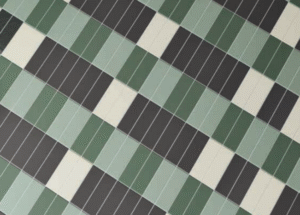 WOW Tile’s Bits in Kale Matt Tile (dark green), Celadon Matt Tile (light green), Storm Matte Tile (black), and Tundra Matte Tile (cream). 